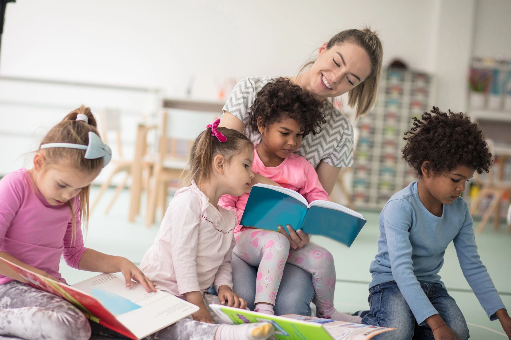 Young children enjoying books in a calm preschool setting